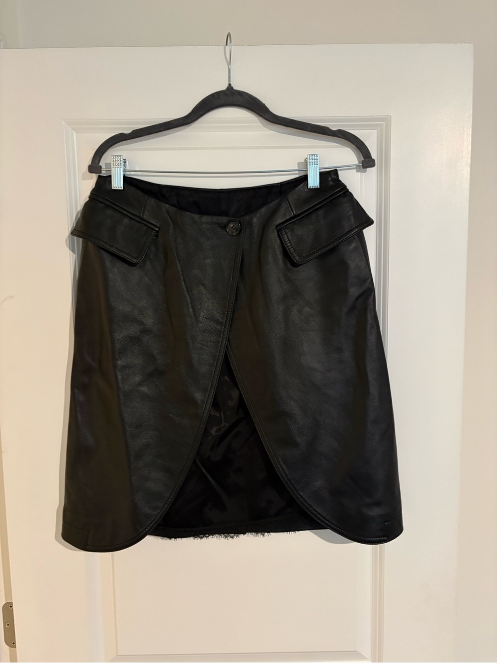 MM6 Maison Margiela Black Leather Wrap Skirt. Chic minimalist designer piece
